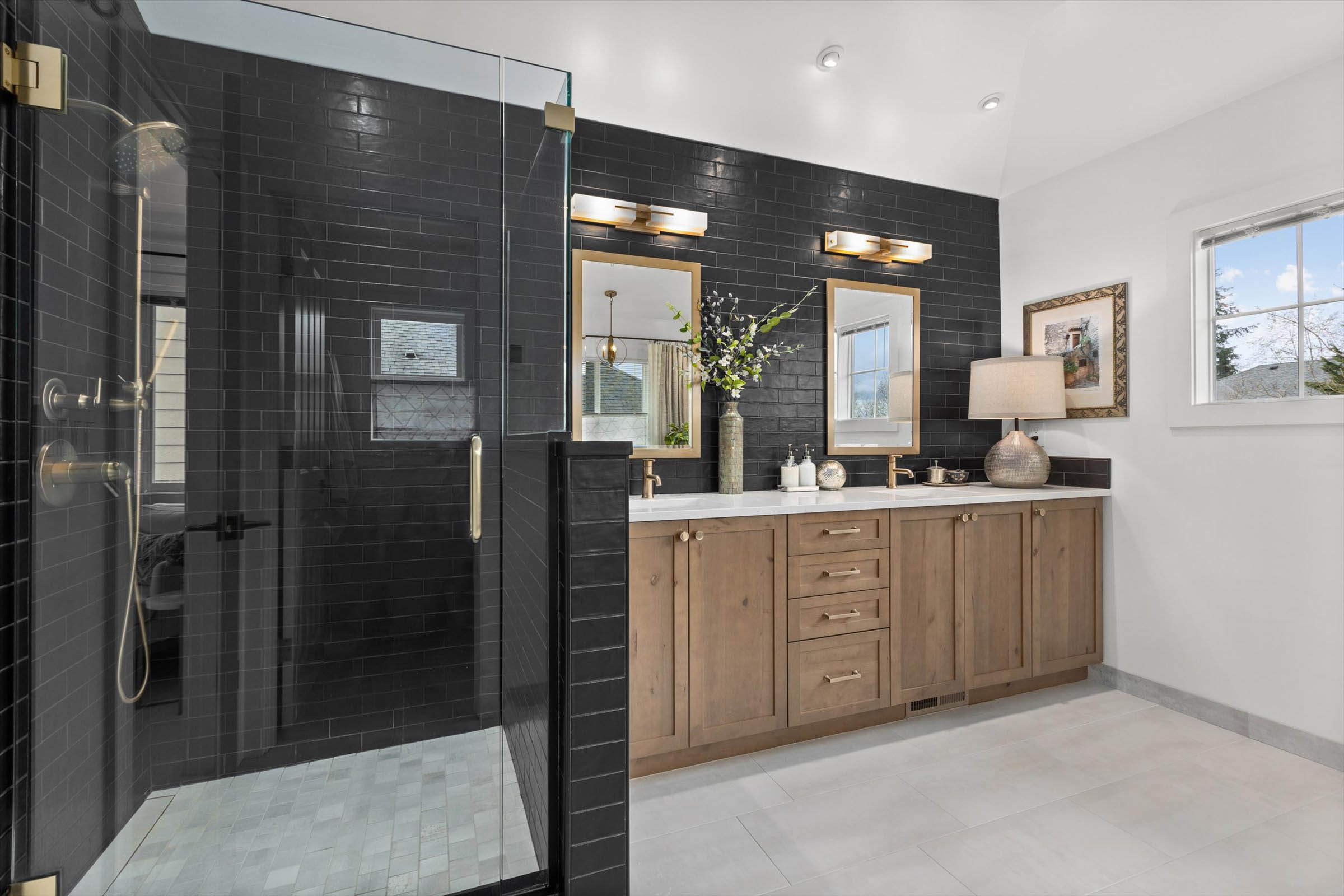 Contemporary bathroom with shower and vanity, renovated for a fresh look.