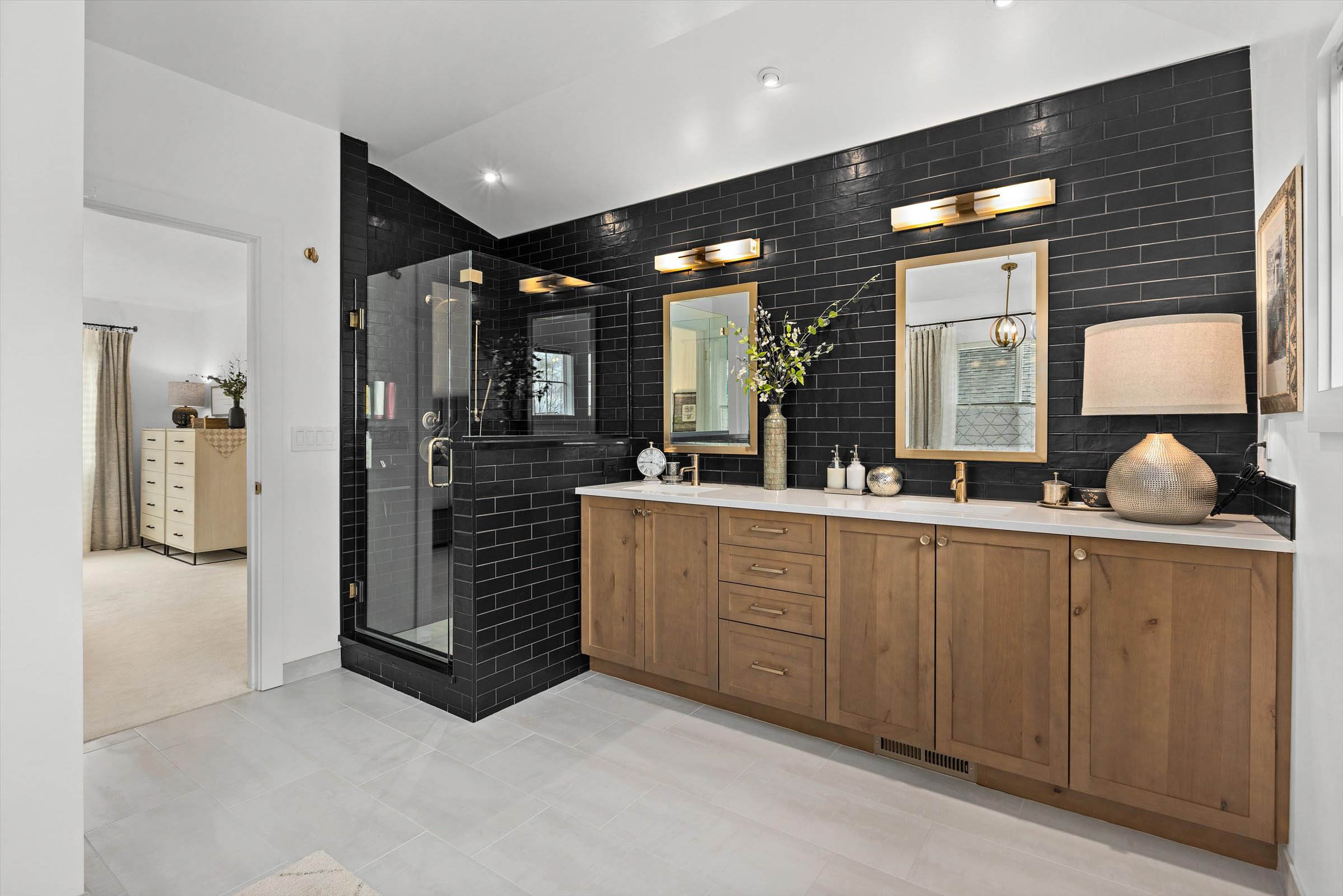 Bathroom remodel featuring a shower and vanity.