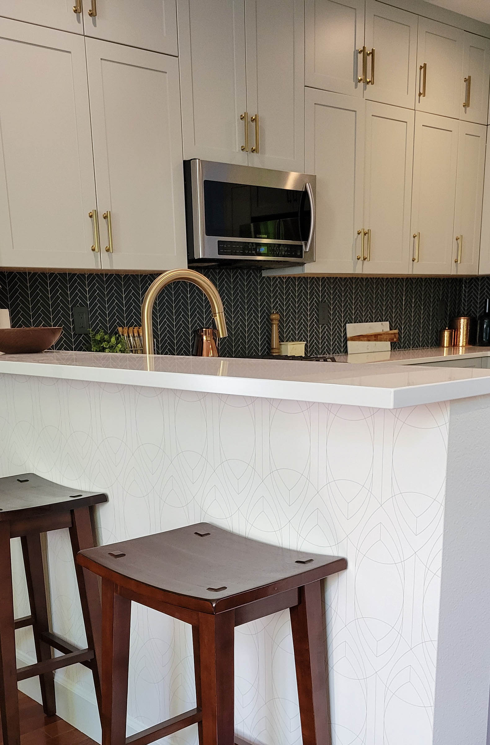 a view of a kitchen counter with stools